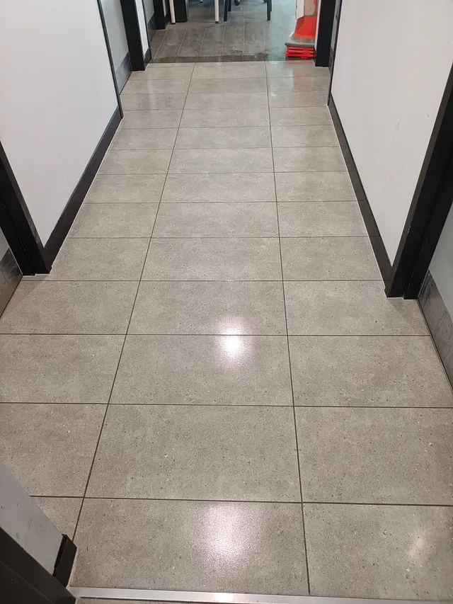 Polished porcelain floor tiles in a hallway